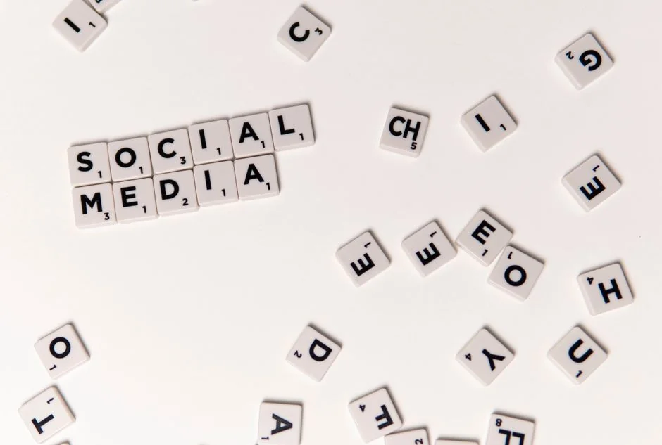 Open planner with Hashtag Campaign handwritten next to keyboard. Ideal for social media and productivity themes.